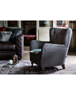 Alexander & James Hansel Chair upholstered in Beagle Bourbon fabric displayed in a living room